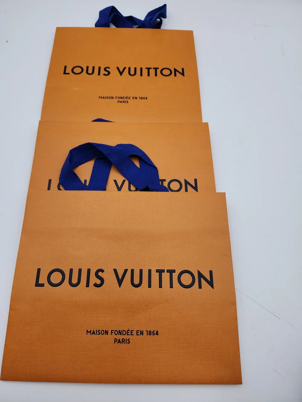 Lot of 5 authentic orange brown Louis Vuitton paper shopping gift medium